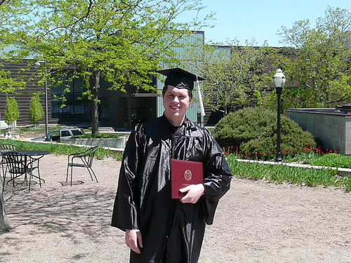 Jim with diploma